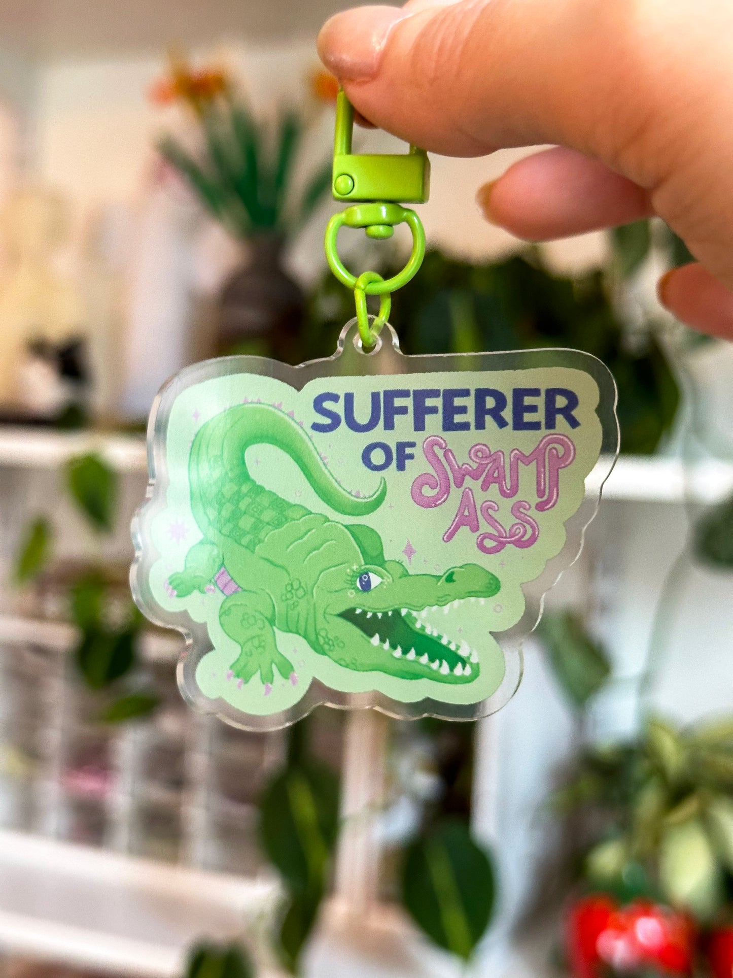 sufferer of swamp ass keychain
