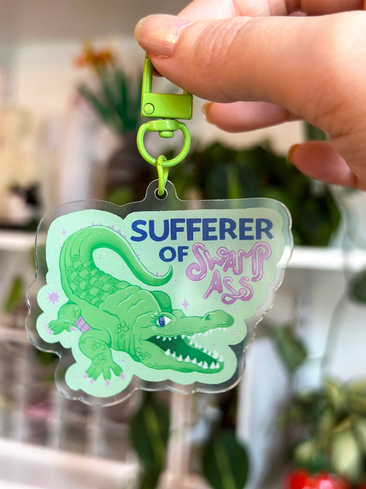 sufferer of swamp ass keychain